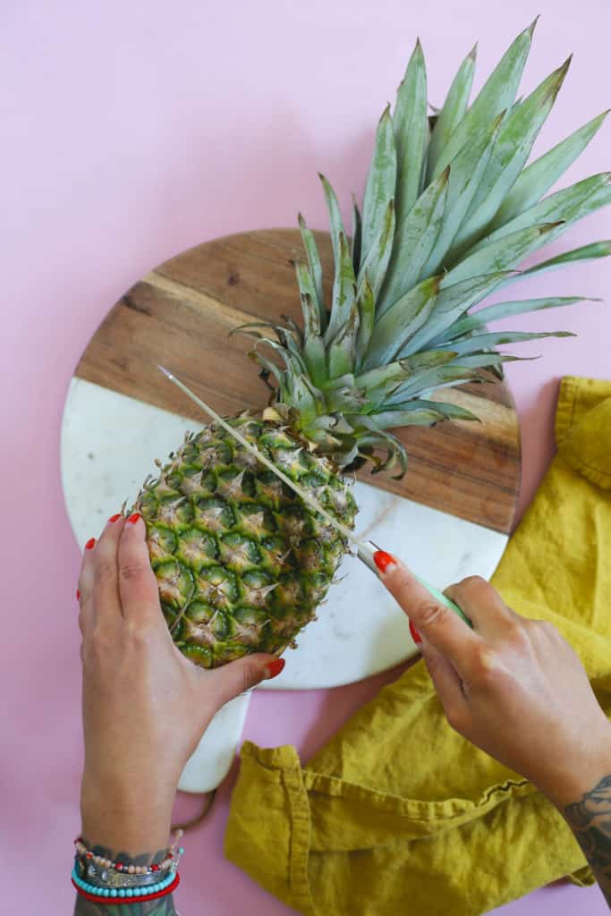 making a pineapple cup for a pina colada